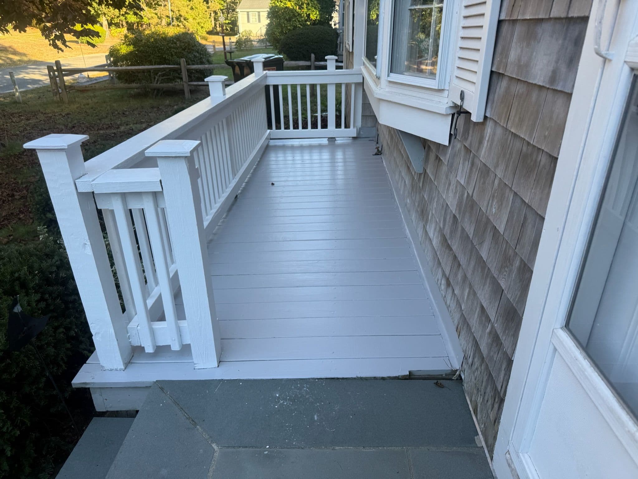Project Freshly Stained Porch Decking Upgrade image